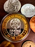 14 tokens one $10 silver casino token