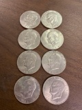 Eight Eisenhower dollars assorted dates