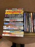 Lot of 27 DVDs,Includes Sherlock season one and two spy kids, space warriors, hunger games. And more