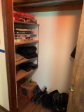 Contents of closet by the front door coats and games