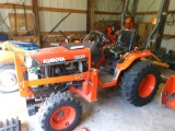 Kubota B2410 tractor with front bucket