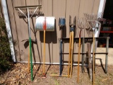 Yard tool lot including gate, post hole digger, Pitchfork, and more see pictures