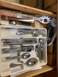 contents of drawer in kitchen