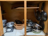 contents in cabinet under stove