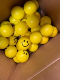 Yellow smiley face bouncy balls