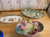 Three handpainted oval trays