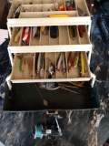 Plano tackle box with lure and fishing reel