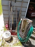 Yard to a lot including propane tank in garden hose