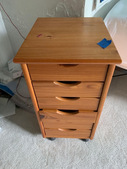 Wooden stand with drawers and wheels