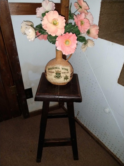Vintage stool with plant