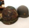 Military helmet with camouflage cover