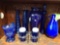Blue glass lot including salt and pepper shakers with holder