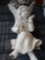 To composite angel figurines approximately 16 inches tall