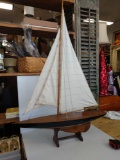 39-in tall by 27-in long wood crafted sailboat