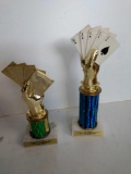 Two 8 inch tall poker trophies