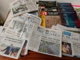 Blade newspapers,life magazines, and Jamie Farr programs