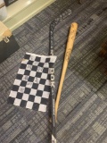 Hockey stick and baseball bat with signatures