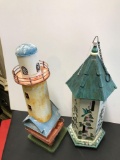 lot bird feeder and lighthouse