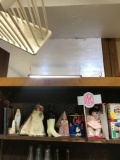 Contents on shelf books doll Fenton religious items