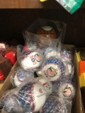 Contents on shelf box of new baseballs pocket chips wooden doll chair reels