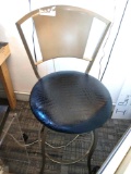 Swivel metal padded bar stool