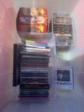 Tote of CDs and empty cases