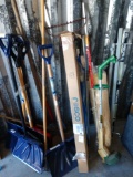 Yard tool lot including snow shovels