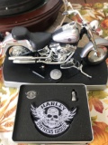 Harley Davidson toy bike and Harley Davidson patch and pins