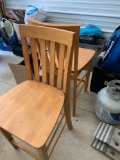 Two tall wooden chairs