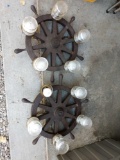 Two ship wheel chandeliers