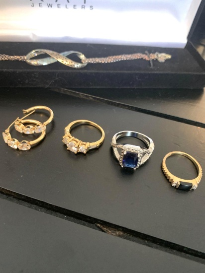 Costume jewelry rings bracelet and earrings