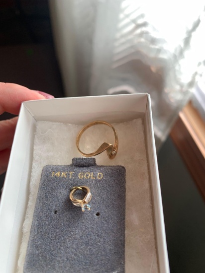 10 karat gold ring and 14 karat charm