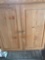 Wooden cabinet with metal bottom 38? across 51? tall
