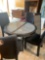 Dining room table with fabric black chairs