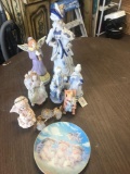 Lot of assorted figurines and angel plate
