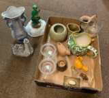 Lots of assorted knickknacks and vases.