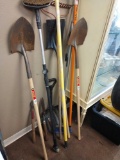 Outdoor hand tool lot including shovels and trimmer