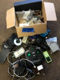 Box of assorted game controller and hook ups