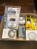 Box of digital timers and 2- boxes of golf balls