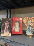 Angel figurines two in original boxes