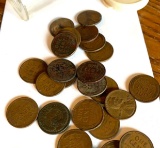 25 Wheat pennies one Indianhead nickel