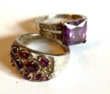 Two lavender colored stone rings
