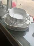 Six corning Ware baking dishes