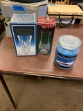 Glass vases still in boxes and ocean blue mist candle