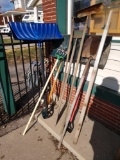 Outdoor tool lot including snow shovels