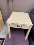 Two matching end tables painted