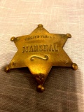 Brass or copper United States Marshal badge