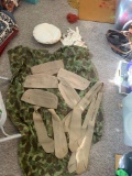 Military hats gloves neck ties and laundry bags