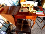 Singer sewing machine with cabinet and chair