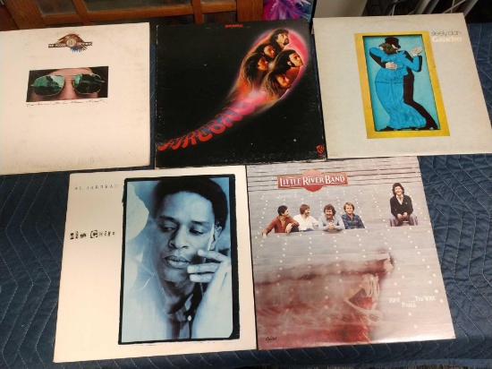 Five record albums including Little River band, Al jarreau, the Doobie Brothers, deep purple, and